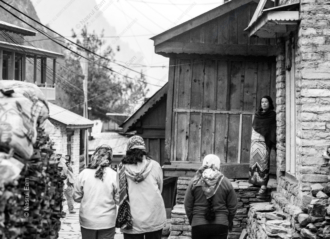 A Woman in a Stone Doorway