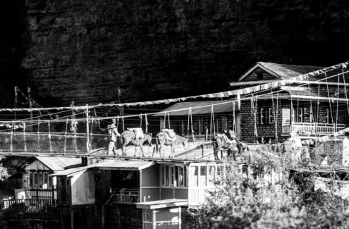 A Caravan Crossing the High Bridge