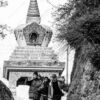 Men Carrying Wood Below the Stupa