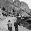 Two Figures on the High Mountain Road