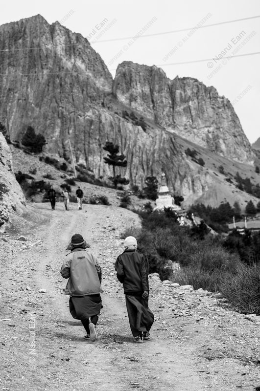 Two Figures on the High Mountain Road