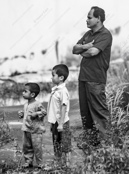 A Father and Two Sons by the Wayside