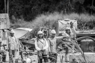 Workers Amidst Coiled Steel - Fine Art Photography Print, Limited Edition Photography, Documentary Photography, Black and White Photography, Industrial Photography