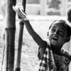Boy Reaching Upward with a Gift - Fine Art Photography Print, Limited Edition Photography, Giclée Print, Black and White Photography, Art Photography Investment