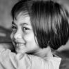 A Young Girl's Smile Over Her Shoulder - Fine Art Photography Print, Limited Edition Photography, Giclée Print, Museum-Quality Photography, Art Photography Investment