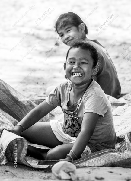 The Smiling Child on the Shore