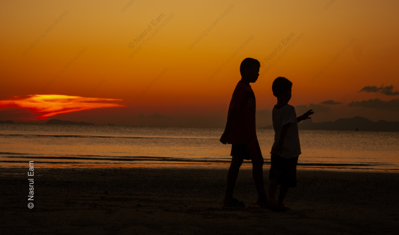 Two Boys on the Evening Shore