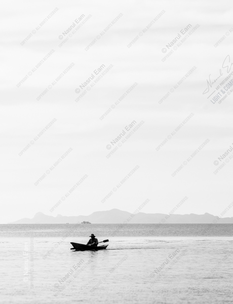 A Lone Boatman, Distant Shore