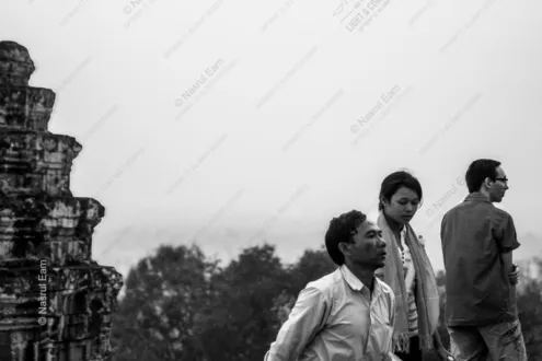Three Travelers by the Temple Wall - Fine Art Photography Print, Limited Edition Photography, Museum-Quality Photography, Black and White Photography, Luxury Photography Art