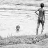 Three Boys at the River's Edge - Fine Art Photography Print, Limited Edition Photography, Black and White Photography,  Museum-Quality Photography,  Contemporary Art Photography