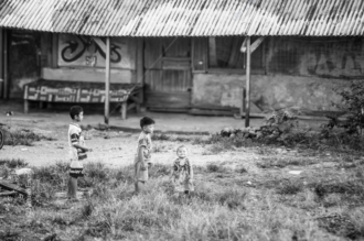 Three Boys in the Grass Before the Porch - Fine Art Photography Print, Limited Edition Photography, Black and White Photography, Giclée Print, Documentary Photography