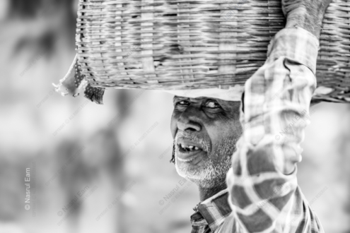 A Man Carrying a Large Woven Basket - Fine Art Photography Print, Limited Edition Print, Monochrome Photography, Giclée Print,  Humanity Photography