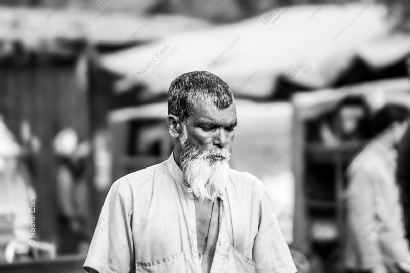 A Man Amidst the Bustling - Fine Art Photography Prints, Limited Edition Prints, Monochrome Photography, Street Photography, Art Photography for Sale