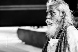 The Elder with Beaded Necklace