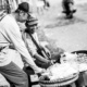 Shared Laughter, Streetside Exchange - Fine Art Photography Print, Limited Edition Photography, Museum-Quality Photography,  Luxury Photography Art, Photography for Collectors