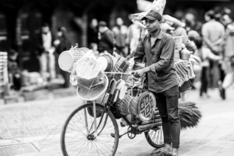 The Young Vendor of Baskets and Brooms - Fine Art Photography Print, Limited Edition Photography, Black and White Photography,  Documentary Photography, Street Photography
