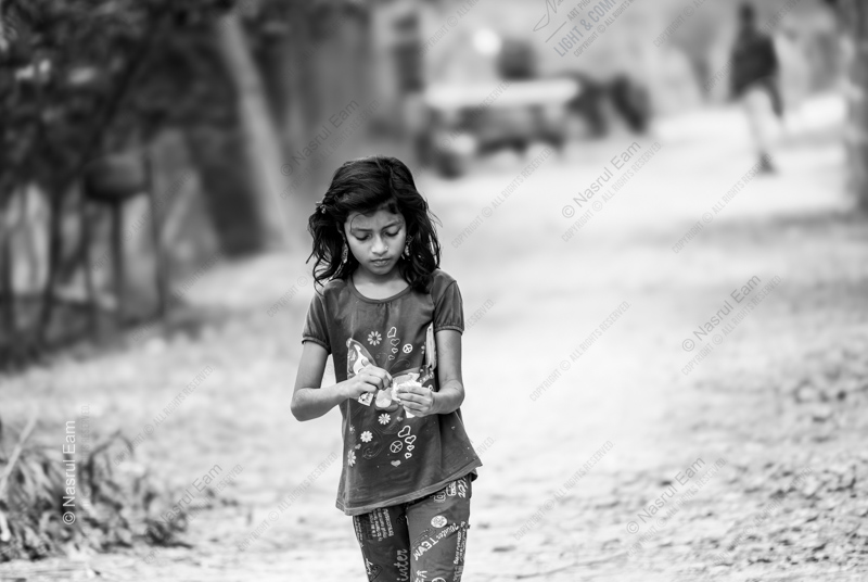 Girl on a Dusty Road