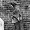Three Figures by the Brick Wall - Fine Art Photography Print, Limited Edition Photography, Black and White Photography, Museum-Quality Print, Art Photography for Sale