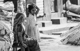 A Girl and a Woman by the Sacks - Fine Art Photography Print, Limited Edition Photography, Black and White Photography, Giclée Print, Human Emotion Photography