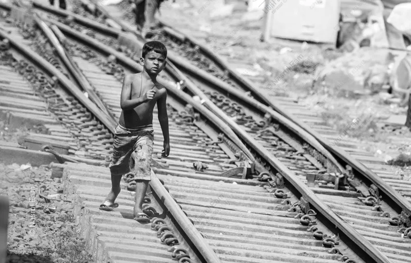 Child of the Rails: A Gaze of Quiet Resolve