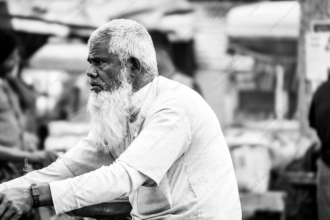 The Blurred Activity Surrounding Him - Fine Art Photography Print, Limited Edition Photography, Giclée Print, Monochrome Portrait, Art Photography for Sale