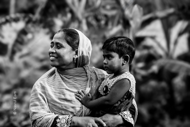 A Mother's Embrace, A Child's Quiet Gaze