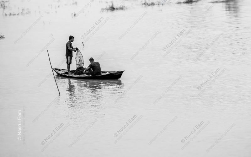 Two Fishermen on a Pale River