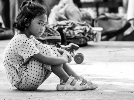 Girl in Polka Dots on the Ground