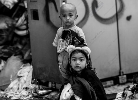 Girl with Bear Ears, Boy by the Wall