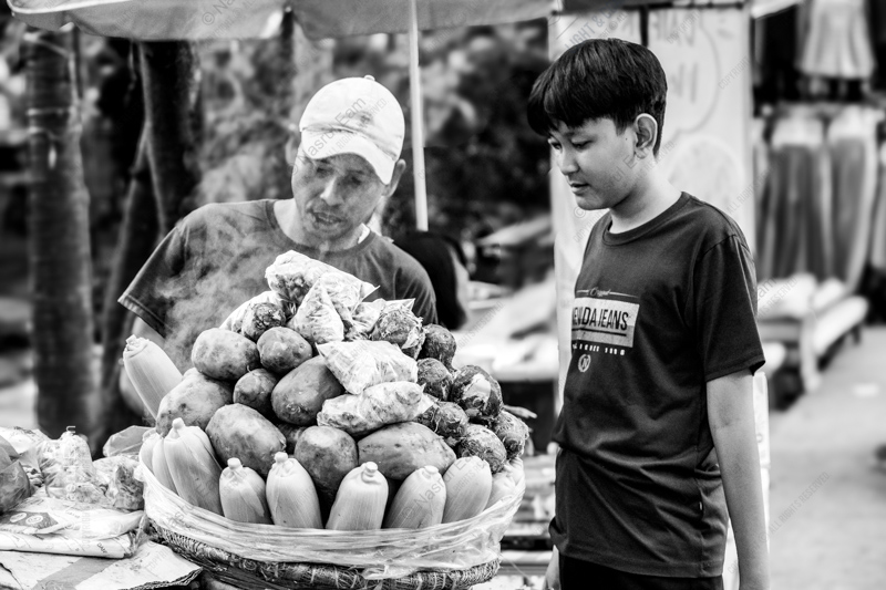 A Boy Before the Steaming Basket