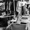 The Laughing Man at the Market Stall - Fine Art Photography Print, Limited Edition Photography, Black and White Photography, Documentary Photography,  Art Photography for Sale