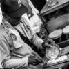 Vendor's Hands at the Griddle