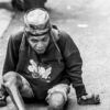 Man with Wooden Blocks on the Pavement