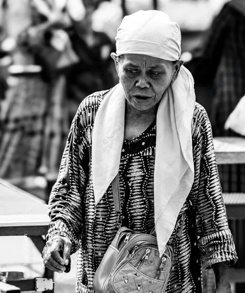 Elderly Woman in a Patterned Tunic