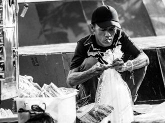 A Vendor's Pause on the Pavement - Fine Art Photography Print, Black and White Photography, Documentary Photography, Street Photography, Limited Edition Print