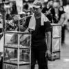 The Vendor with the Glass Case - Fine Art Photography Print, Limited Edition Photography, Contemporary Art Photography, Documentary Photography, Black and White Photography