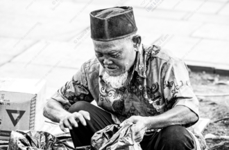 An Elder Sorting His Wares - Fine Art Photography Print, Limited Edition Photography, Museum-Quality Photography, Black and White Photography, Photography Art for Collectors