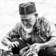 An Elder Sorting His Wares - Fine Art Photography Print, Limited Edition Photography, Museum-Quality Photography, Black and White Photography, Photography Art for Collectors