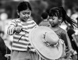 Two Girls and the Woven Hat - Fine Art Photography Print, Limited Edition Photography, Giclée Print, Black and White Photography, Documentary Photography