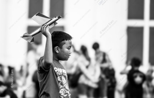 A Boy Lifting His Airplane - Fine Art Photography Print, Limited Edition Photography, Museum-Quality Photography, Art Photography for Collectors, High-End Photography Prints