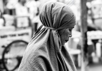 The Woman in the Gray Headscarf