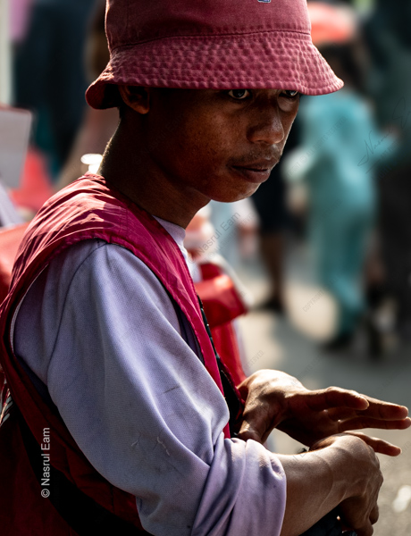 Man in the Red Hat and Lavender Shirt