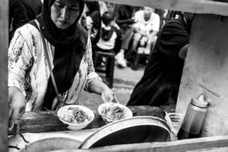 A Woman at Her Food Stall - Fine Art Photography Print, Limited Edition Photography, Giclée Print, Black and White Photography, Contemporary Art Photography