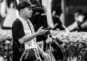 Man with Keffiyeh and Woman in Niqab - Fine Art Photography Print, Limited Edition Photography, Black and White Photography, Portrait Photography, Contemporary Art Photography