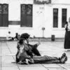 A Father and Child Seated in the Plaza