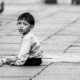 The Solitary Child on the Walkway