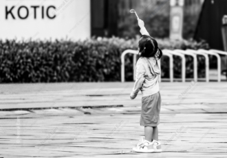 The Girl with the Raised Wand