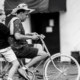 Man and Boy on a Shared Bicycle
