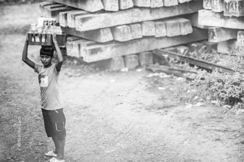 Boy with a Crate of Bottles - Fine Art Photography Prints, Limited Edition Photography, Giclée Print, Black and White Photography, Contemporary Art Photography