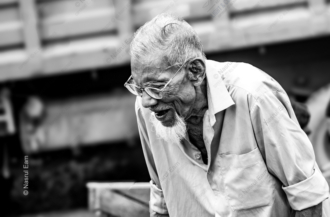 The Laughing Elder with the White Goatee